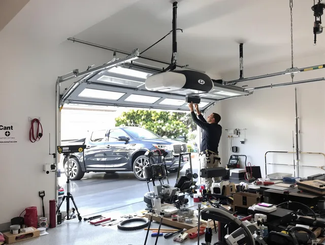 Claremont Garage Door Repair specialist installing smart garage door opener system in Claremont home