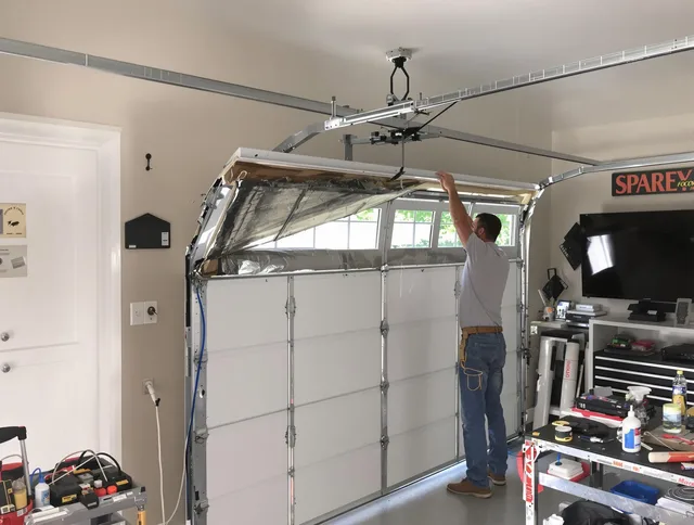Garage door section replacement by Claremont Garage Door Repair in Claremont