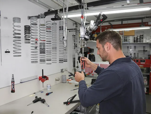 Claremont Garage Door Repair safety certified technician performing precision spring replacement in Claremont