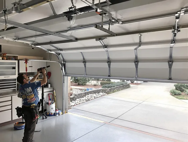Garage door track repair service by Claremont Garage Door Repair in Claremont